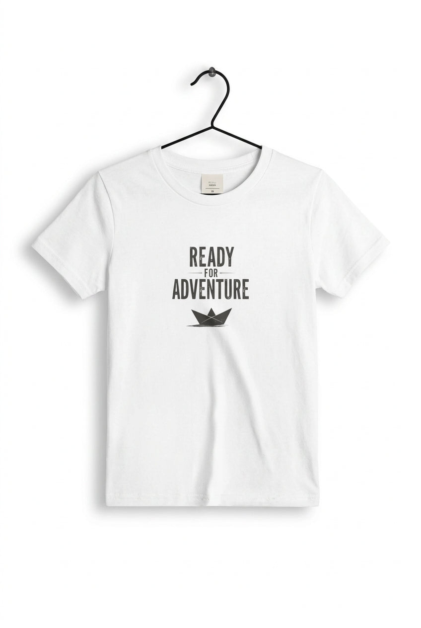 Kids white T‑shirt with bold black “Ready for Adventure” text and a small paper boat graphic.
