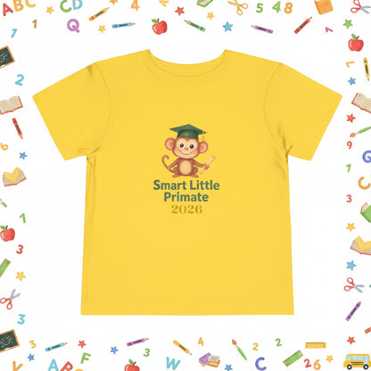 YellowToddler T‑shirt with a cheerful monkey wearing a graduation cap and holding a diploma, with the text ‘Smart Little Primate 2026" on the front.