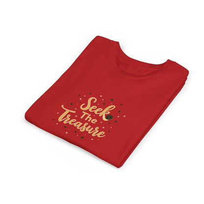 Kids folded red T‑shirt with golden “Seek the Treasure” lettering surrounded by small star accents.