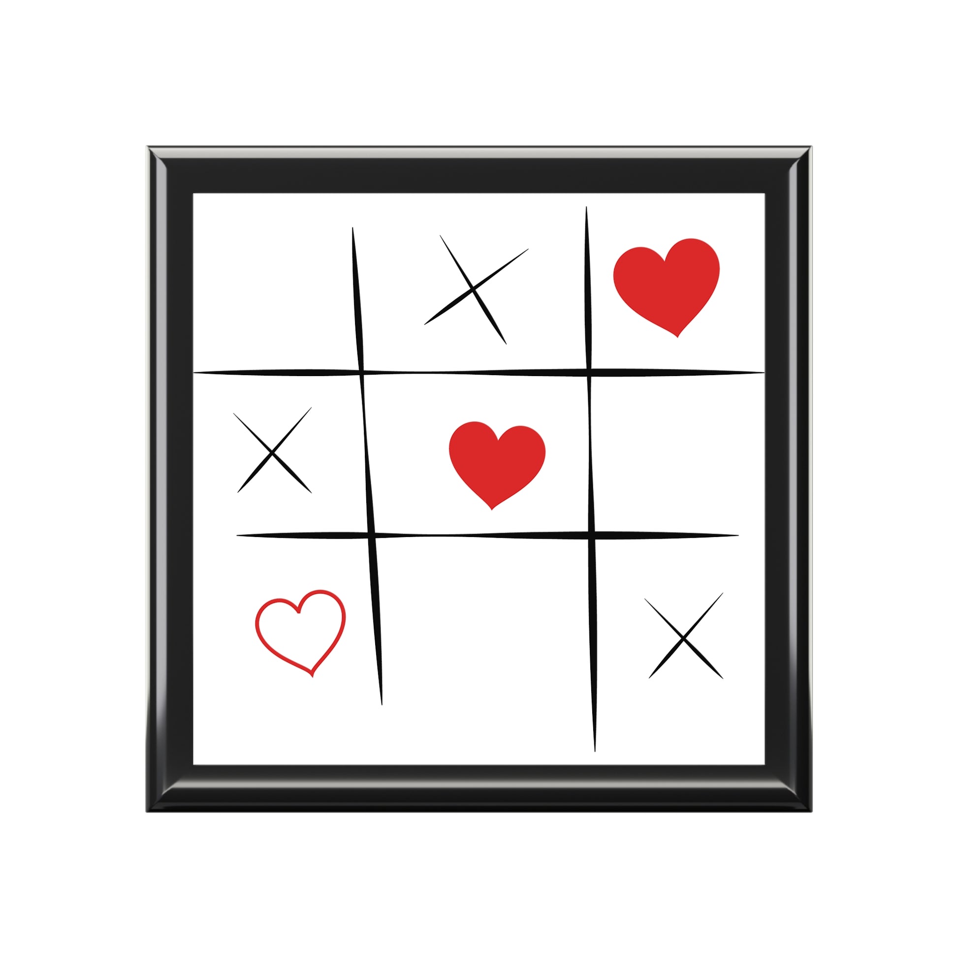Jewelry box with framed image of tic tac love grid.