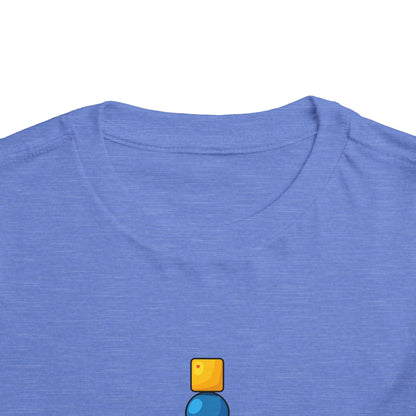 Close-up of a heathered periwinkle blue t-shirt showing the inner collar and the top of a small graphic print featuring a yellow square and blue circle.