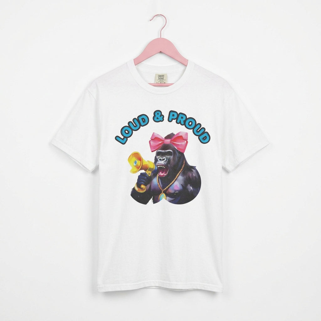 “Girl‑Girl™ cheerleader gorilla with pink bow and megaphone on a white unisex tee with the phrase ‘Loud & Proud.’”