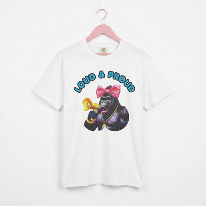“Girl‑Girl™ cheerleader gorilla with pink bow and megaphone on a white unisex tee with the phrase ‘Loud & Proud.’”