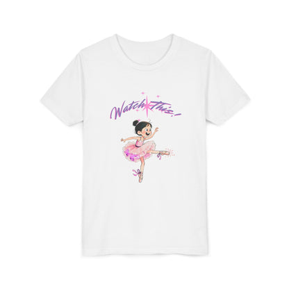 A white short-sleeve crewneck t-shirt featuring a cartoon graphic of a ballerina in a pink tutu with the text 'Watch This!' in purple script above her, displayed on a clean white background.
