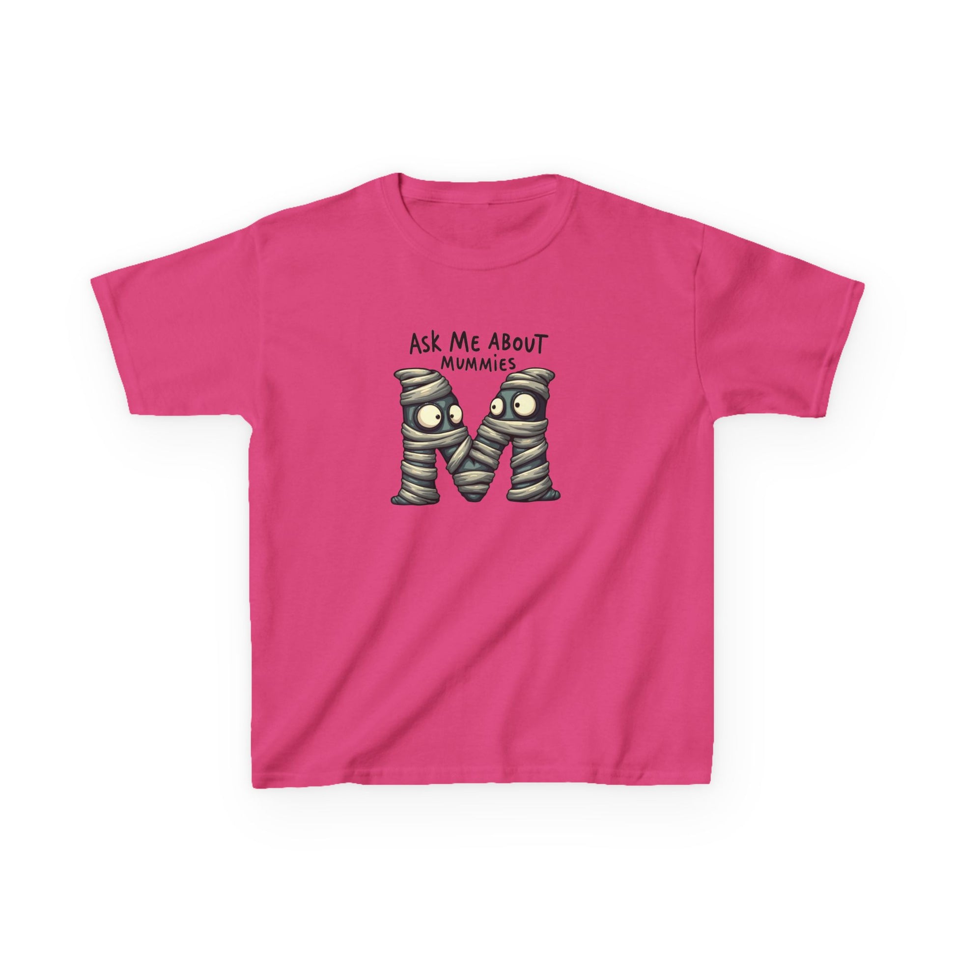 A bright pink. heliconia short-sleeve t-shirt with a graphic of the letter 'M' styled as two mummies wrapped in bandages, with the text 'ASK ME ABOUT MUMMIES' above it, shown on a plain white background.