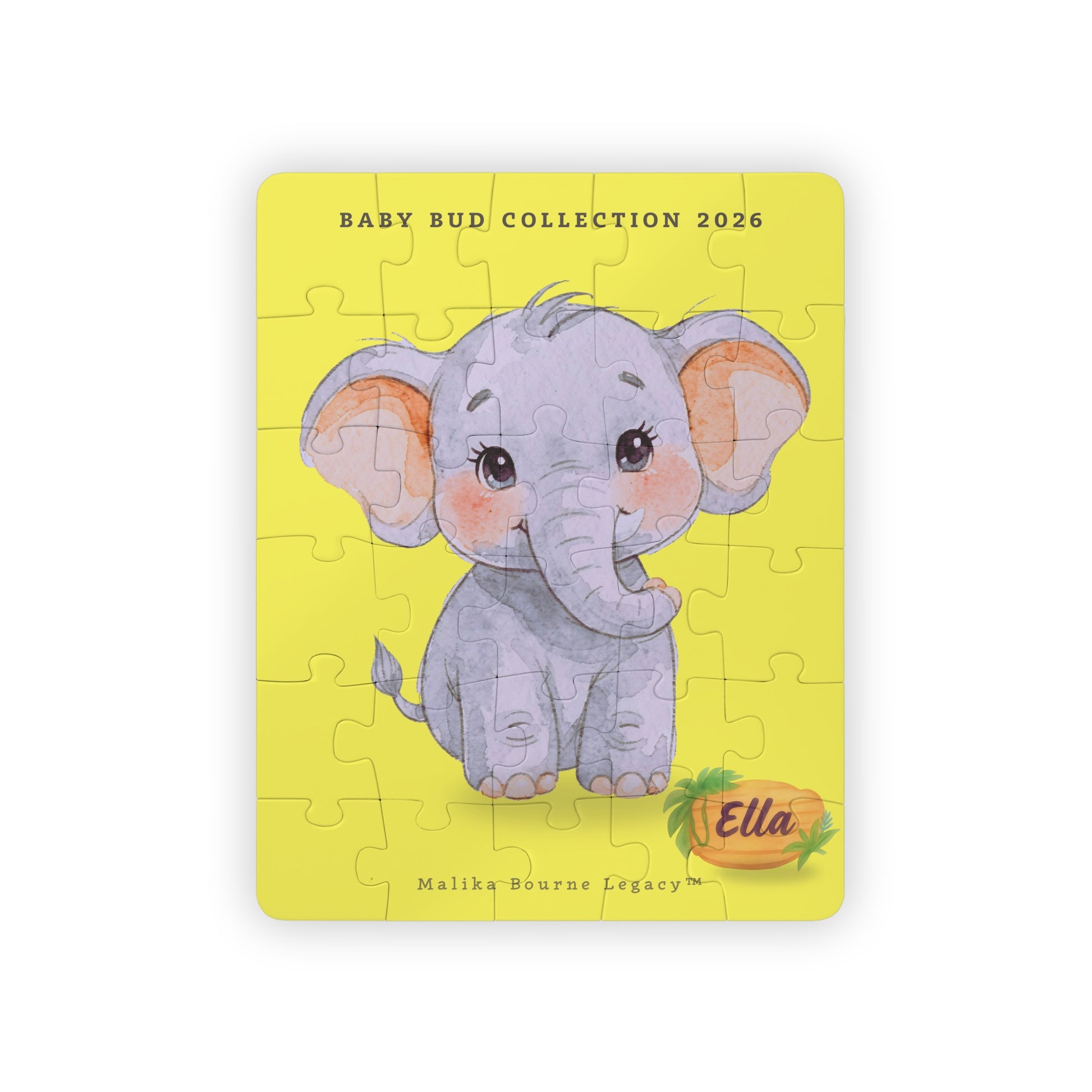 Jigsaw puzzle with a cute elephant design on a yellow background, featuring the brand 'Ella'.