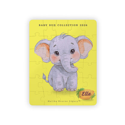 Jigsaw puzzle with a cute elephant design on a yellow background, featuring the brand 'Ella'.