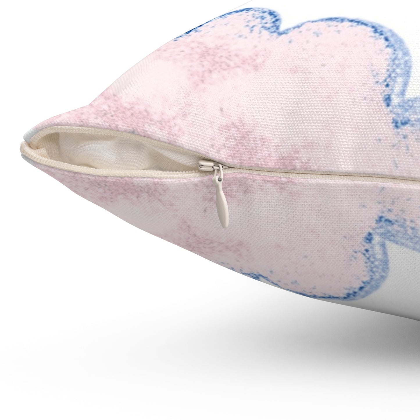 Zipper closure for pillow with pink and blue abstract design on a white background