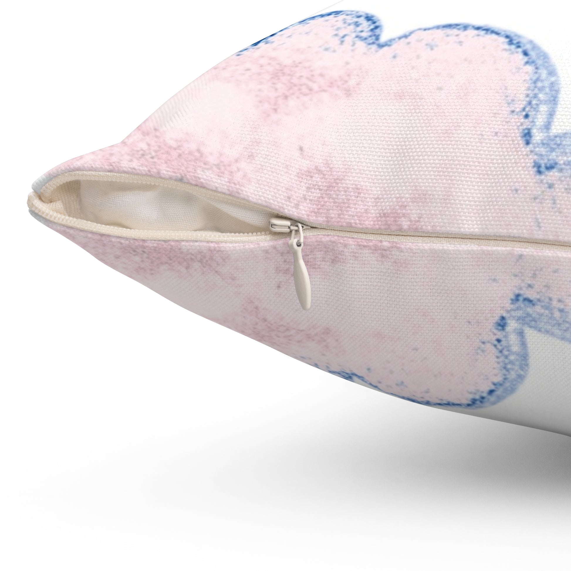 Zipper closure for pillow with pink and blue abstract design on a white background