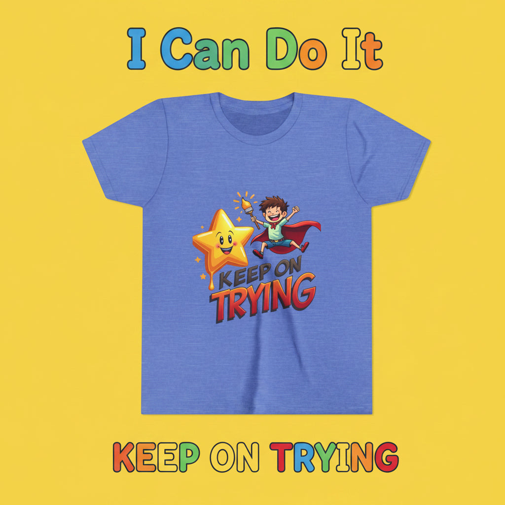 Blue t-shirt with a superhero and star graphic and 'Keep on Trying' text on a white background