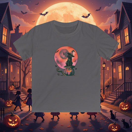 A dark gray short-sleeve t-shirt with a Halloween-themed graphic of a witch sitting on a jack-o'-lantern pumpkin in front of a pink and orange full moon.
