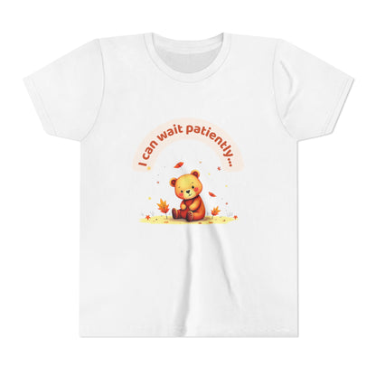 White t-shirt with a teddy bear graphic and text on a white background