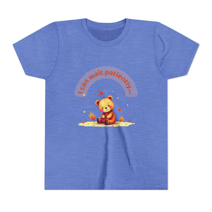 Blue t-shirt with a teddy bear graphic and text on a white background