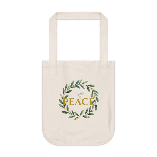 Beige tote bag with 'PEACE' design featuring leaves on a white background
