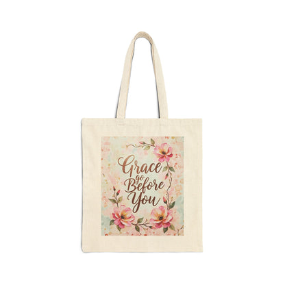 Tote bag with floral design and 'Grace Go Before You' text on a white background