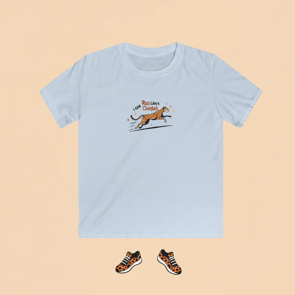 A light blue short-sleeve crewneck t-shirt featuring a small graphic on the chest of a running cheetah with the text 'I can Run Like a Cheetah' in orange and black.