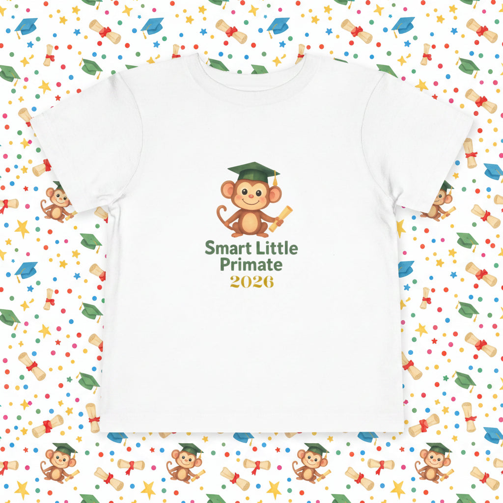 “Toddler T‑shirt with a cheerful monkey wearing a graduation cap and holding a diploma, with the text ‘Smart Little Primate 2026’ on the front.”