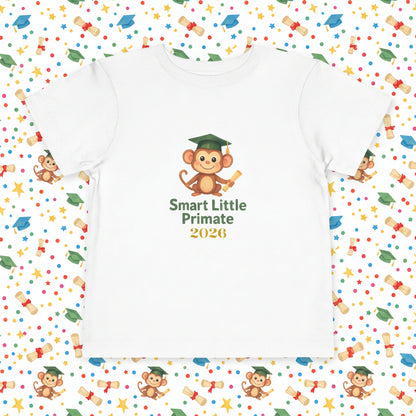 “Toddler T‑shirt with a cheerful monkey wearing a graduation cap and holding a diploma, with the text ‘Smart Little Primate 2026’ on the front.”