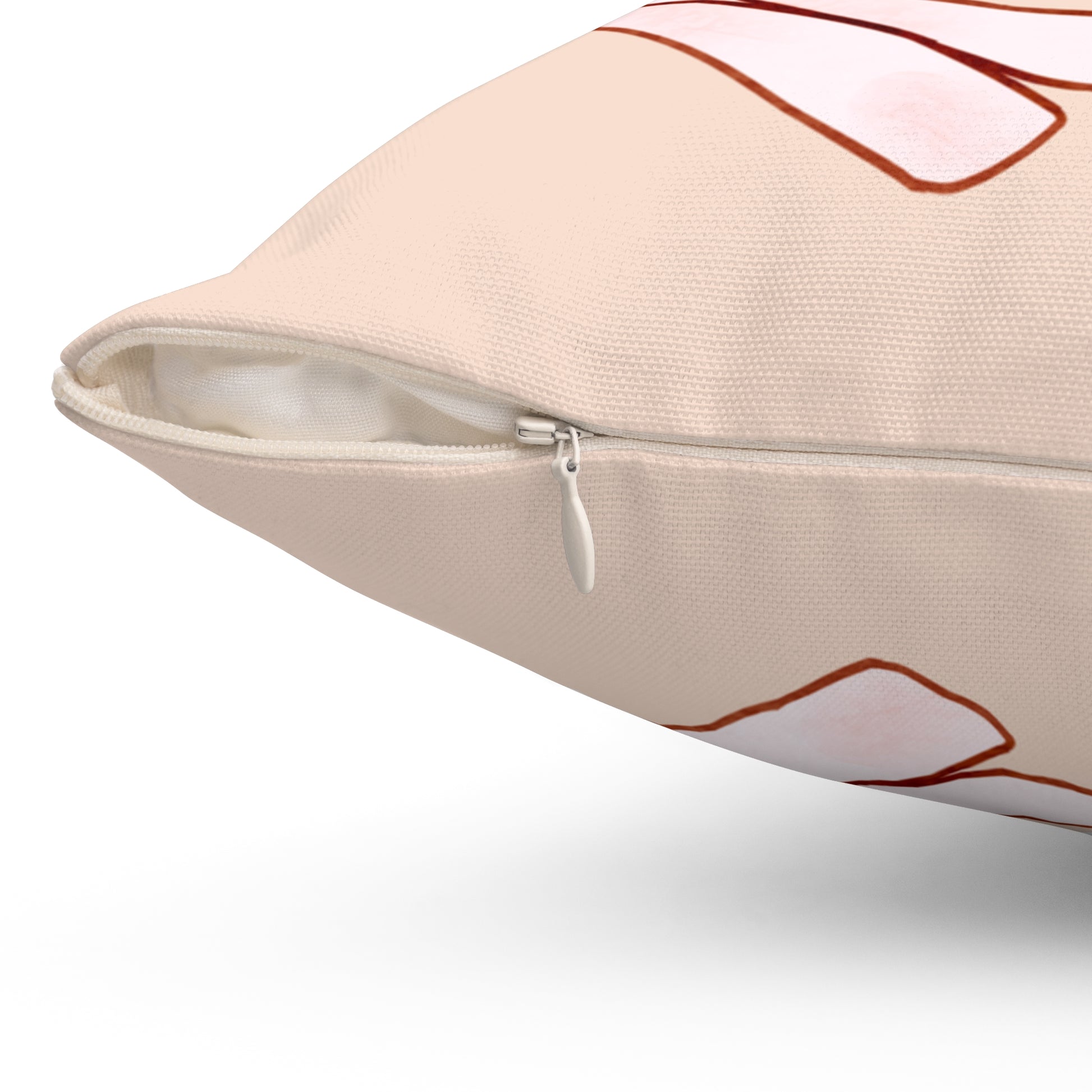 Beige pillow with a zipper on a white background