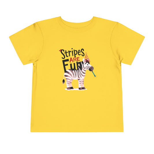 Yellow Toddler t-shirt with a zebra wearing a striped party hat and blowing a striped party blower, with text reading ‘Stripes Are FUN.’