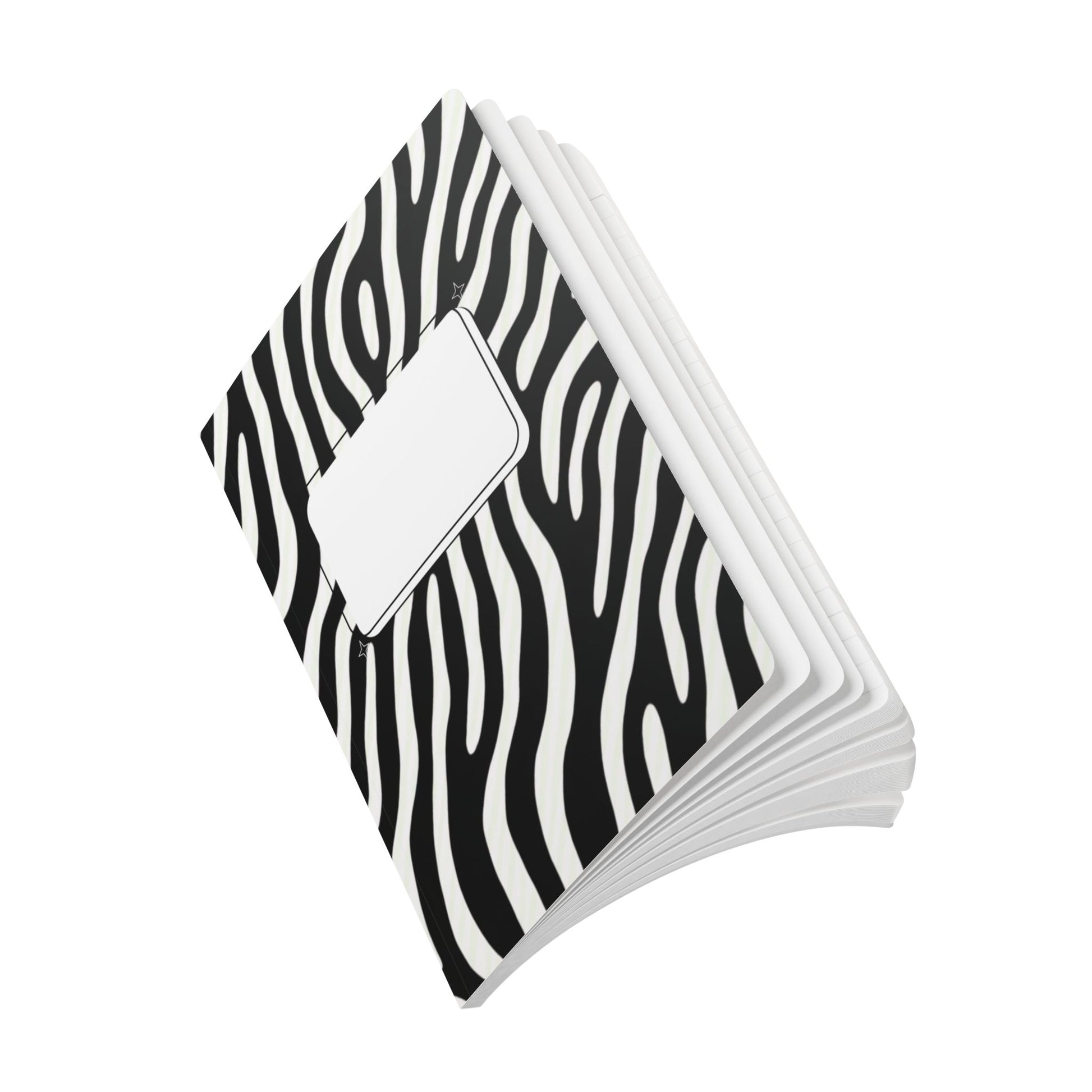 Stack of black and white zebra patterned notebooks on a white background