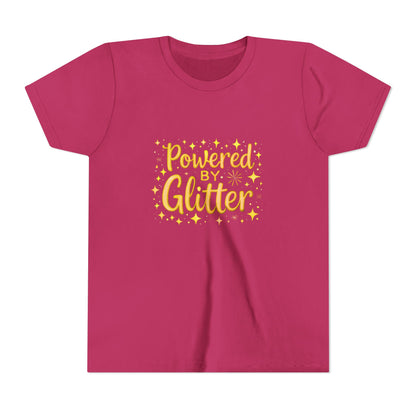 A bright pink short-sleeve t-shirt with a yellow graphic on the chest that reads 'Powered by Glitter' in a stylized font, surrounded by small yellow stars and sparkles, shown on a plain white background.