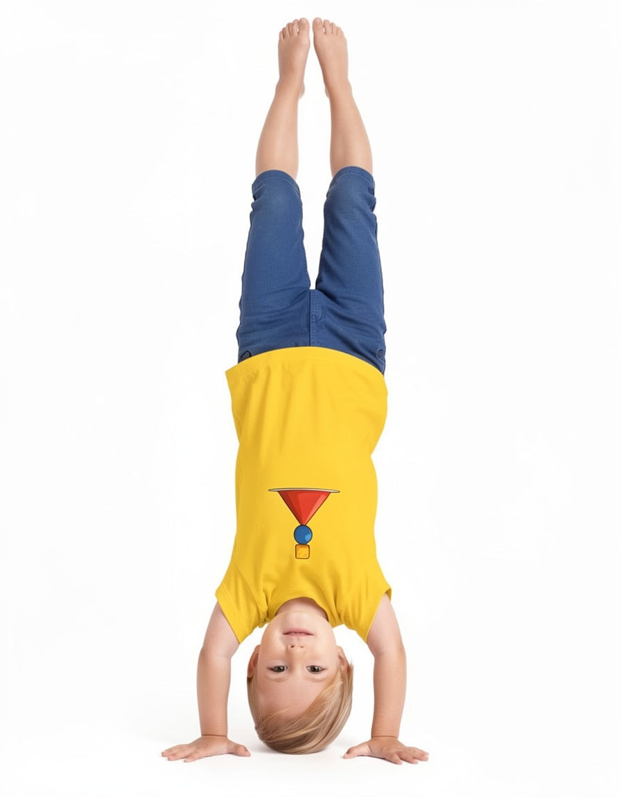 A child wearing a bright yellow t-shirt and blue shorts is performing a handstand against a solid white background.