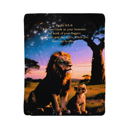 Rectangular printed blanket with a male lion and cub gazing at the starry night sky. Quote from Psalms 8.