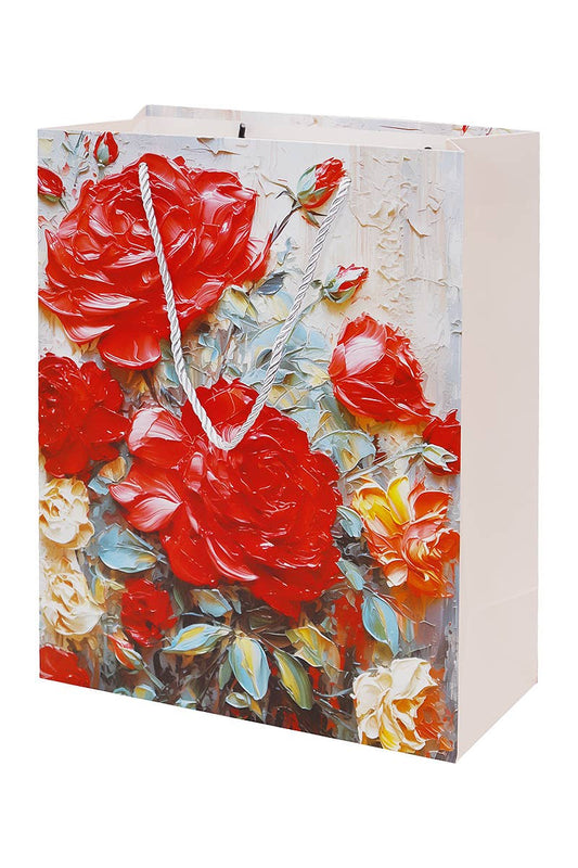 Gift bag with red floral design on a white background