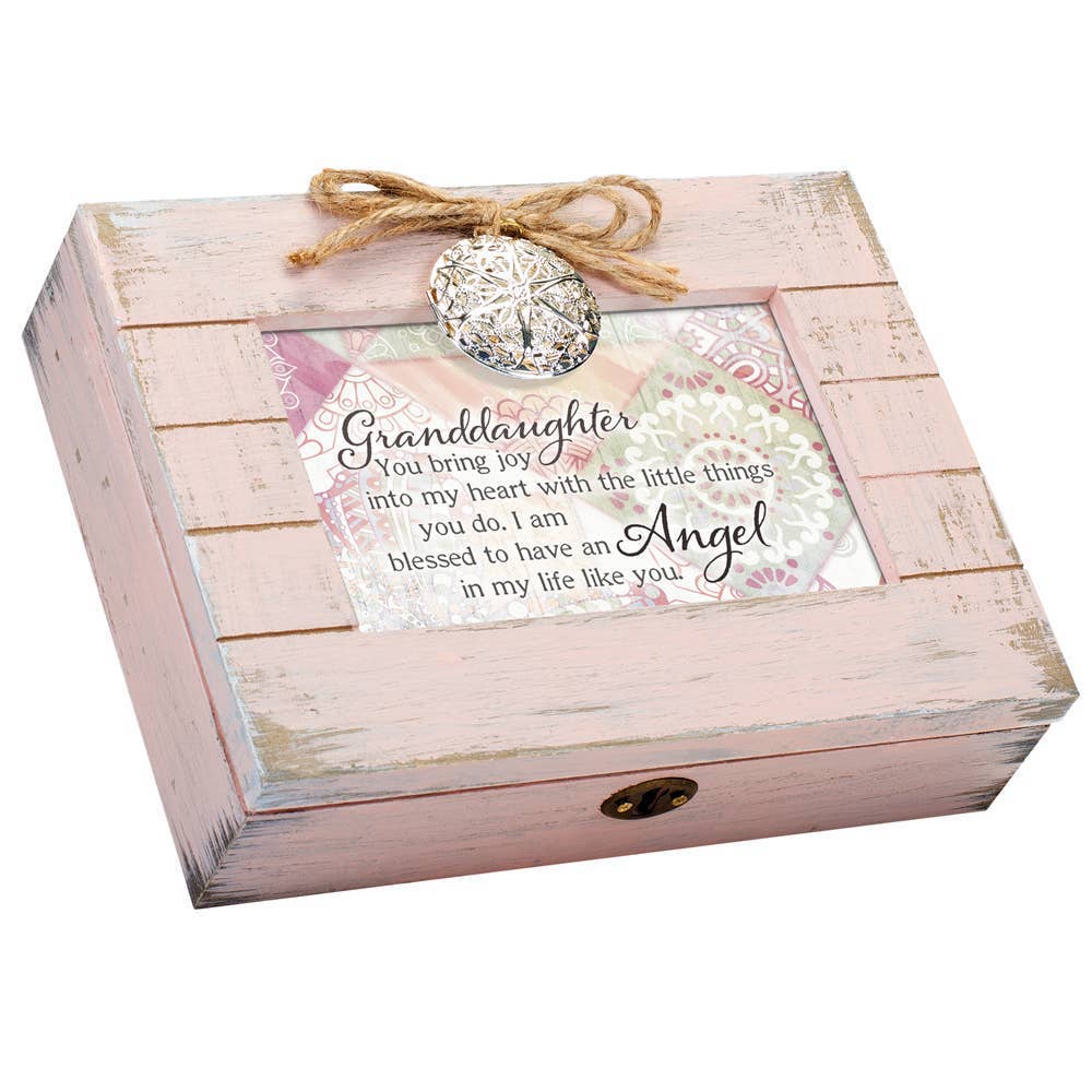 Wooden box with decorative ribbon and message card on a white background