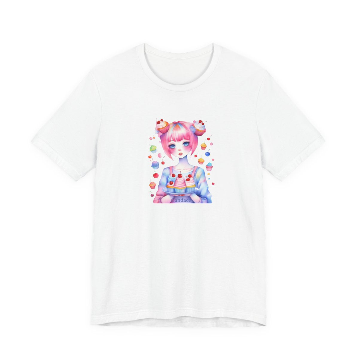 Girl with pink hair holding a cupcake with floating cherries printed ona white shirt.