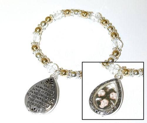 Bracelet with teardrop-shaped charms on a white background