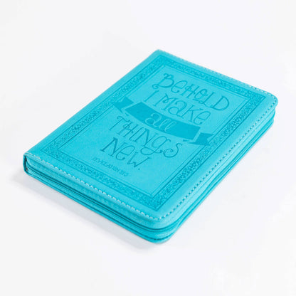 Turquoise notebook with embossed text on a white background